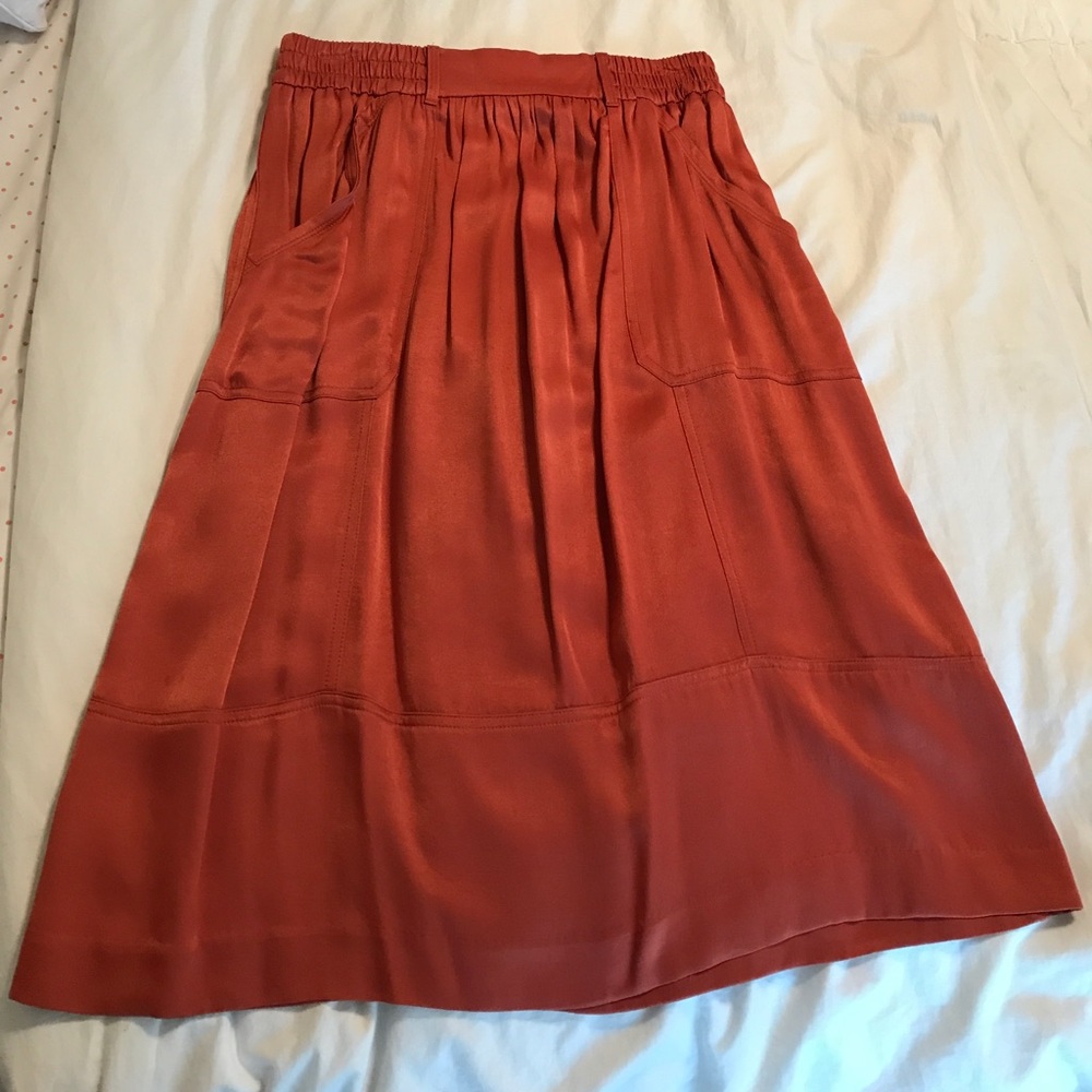 Burnt orange Loft midi skirt. NWOT