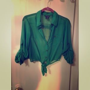 Cute sheer green top with tie in the front!