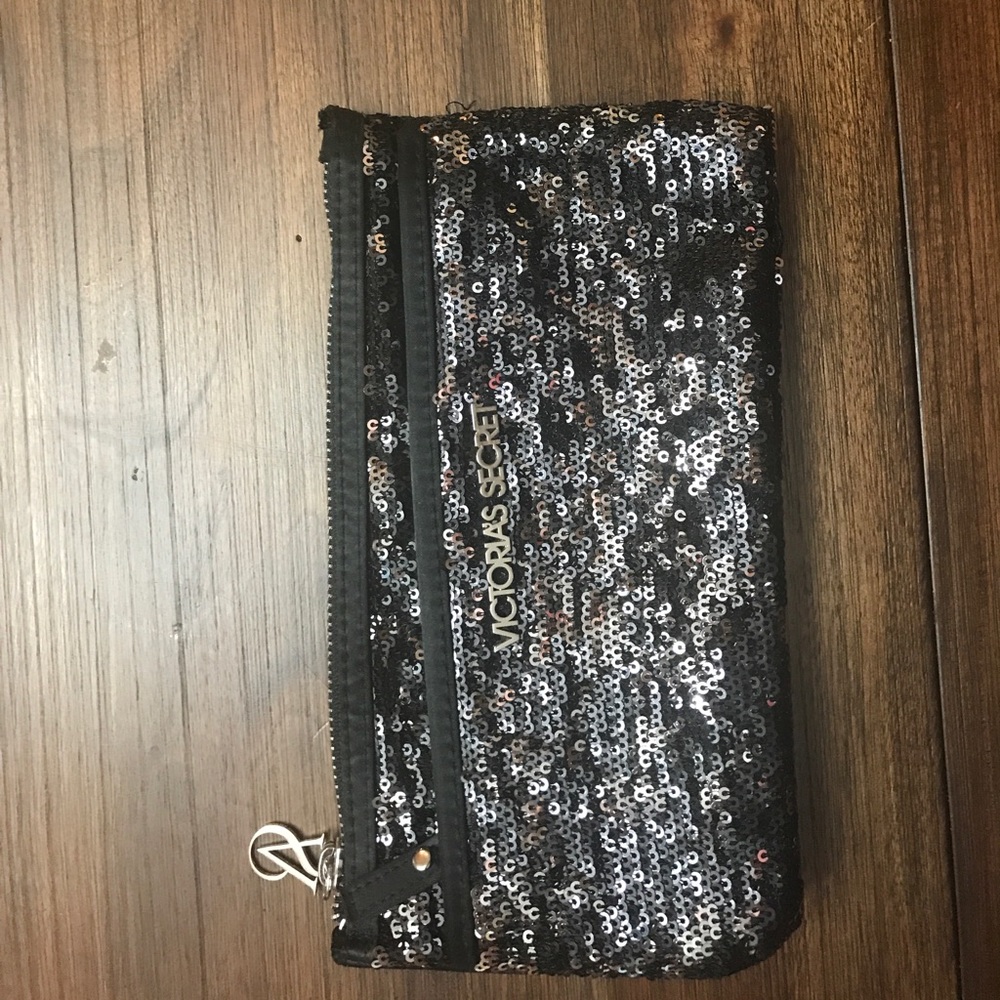Victoria’s Secret black sequin pouch. NWOT