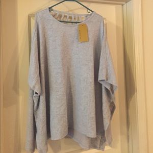 Fuzzy (super soft) poncho in Blue with cage back!