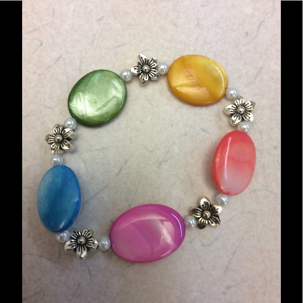 Pastel/Floral earrings with matching bracelet