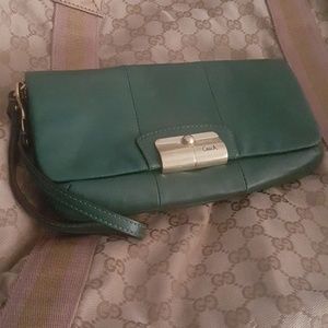 Green leather Coach wristlet