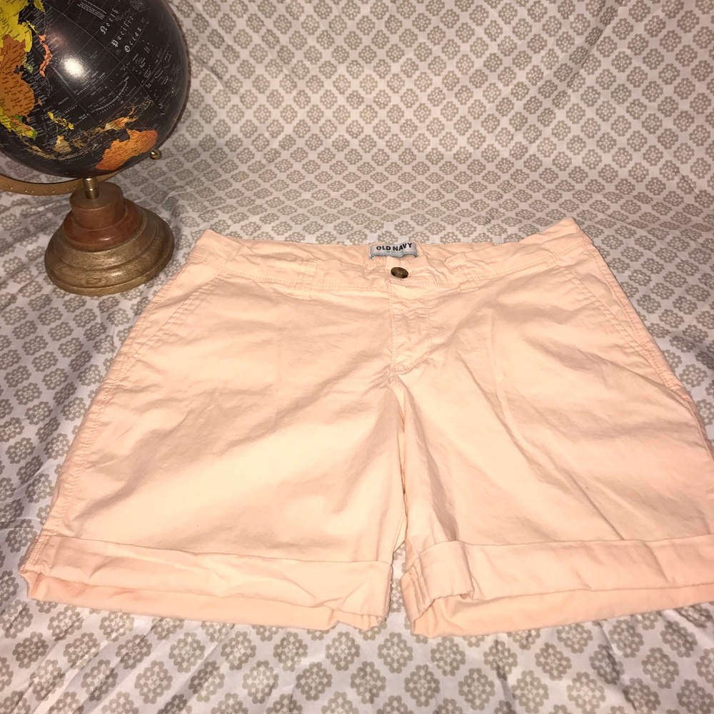 Great used condition, longer light orange shorts