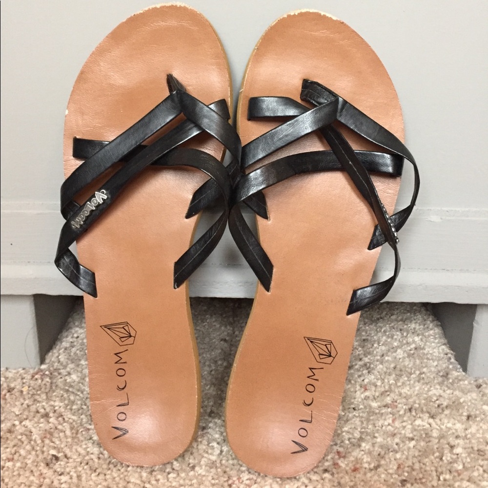 Black and brown Volcom sandals