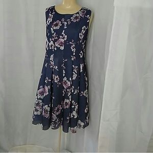 Torrid brand. Grey/blue, pink, and white dress.