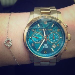 Michael Kors “Watch Hunger Stop” Women’s Watch