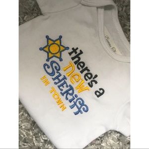 Onesie “There’s a new Sheriff in town”