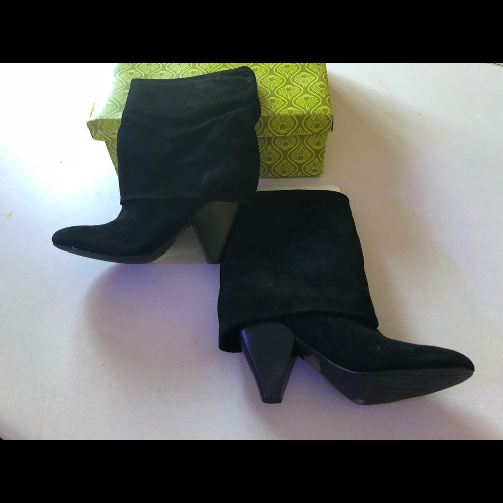 Black suede heel boots .