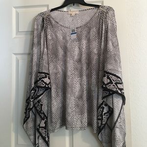 Michael Kors flared arms shirt.