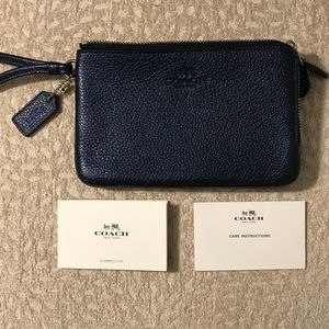 Coach leather wristlet in navy blue (brand new)