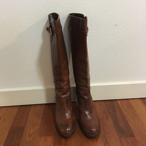 Michael Kors tall boots- 7.5 size but fits 8 also.
