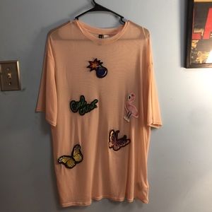 Pink mesh t shirt with patches