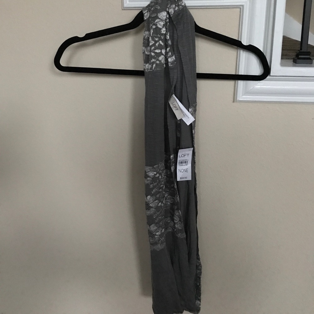 Gray scarf.
