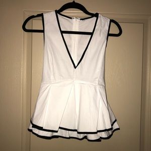 White sleeveless blouse