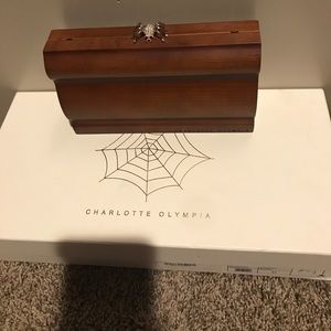 Charlotte Olympia wood clutch purse