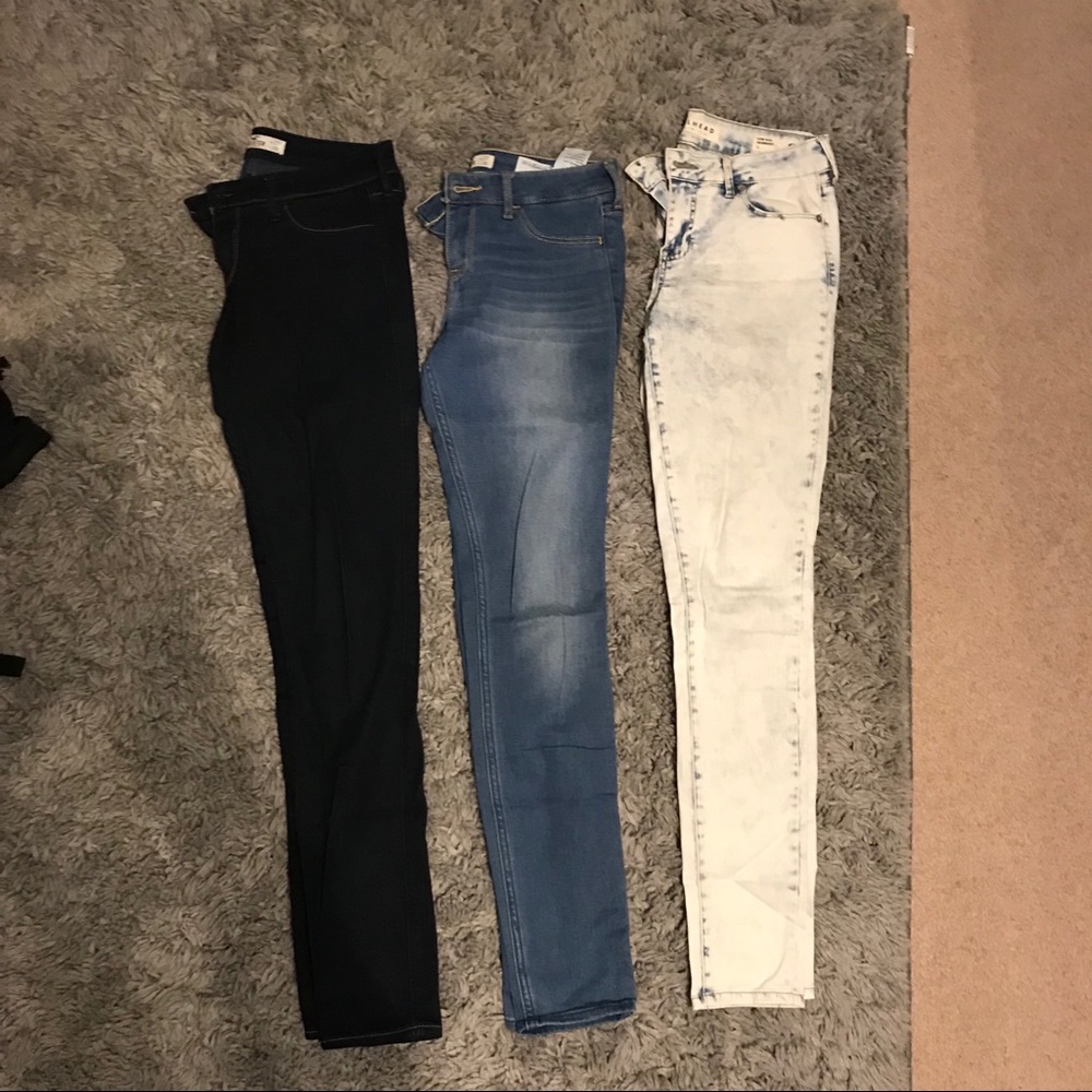 3 pairs of light, medium, and dark wash jeans