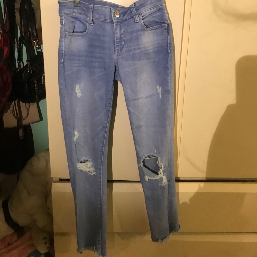 Light blue distressed low rise denim jegging