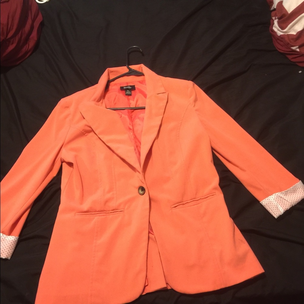 One buttoned orange blazer