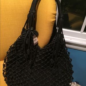 Beautiful black leather hobo style bag