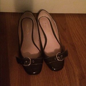 Aldo's brown shoes