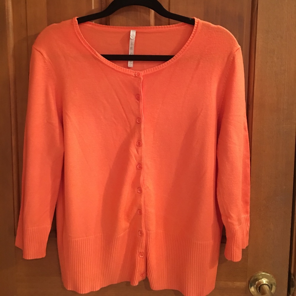 Pretty pumpkin colored cardigan!