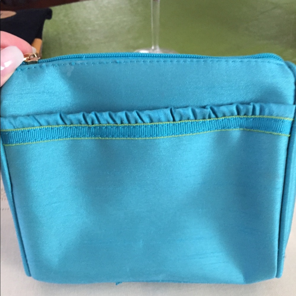 Estee Lauder turquoise make up bag