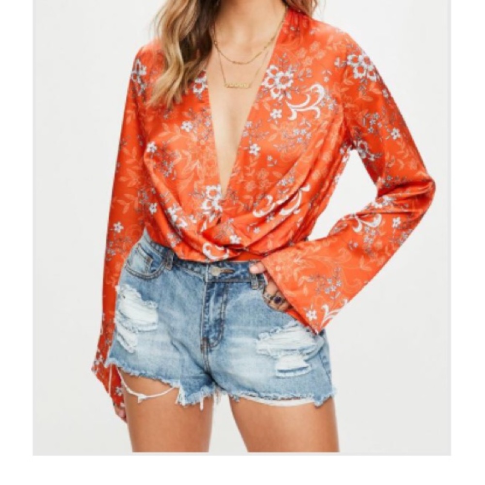 Long sleeve orange bodysuit