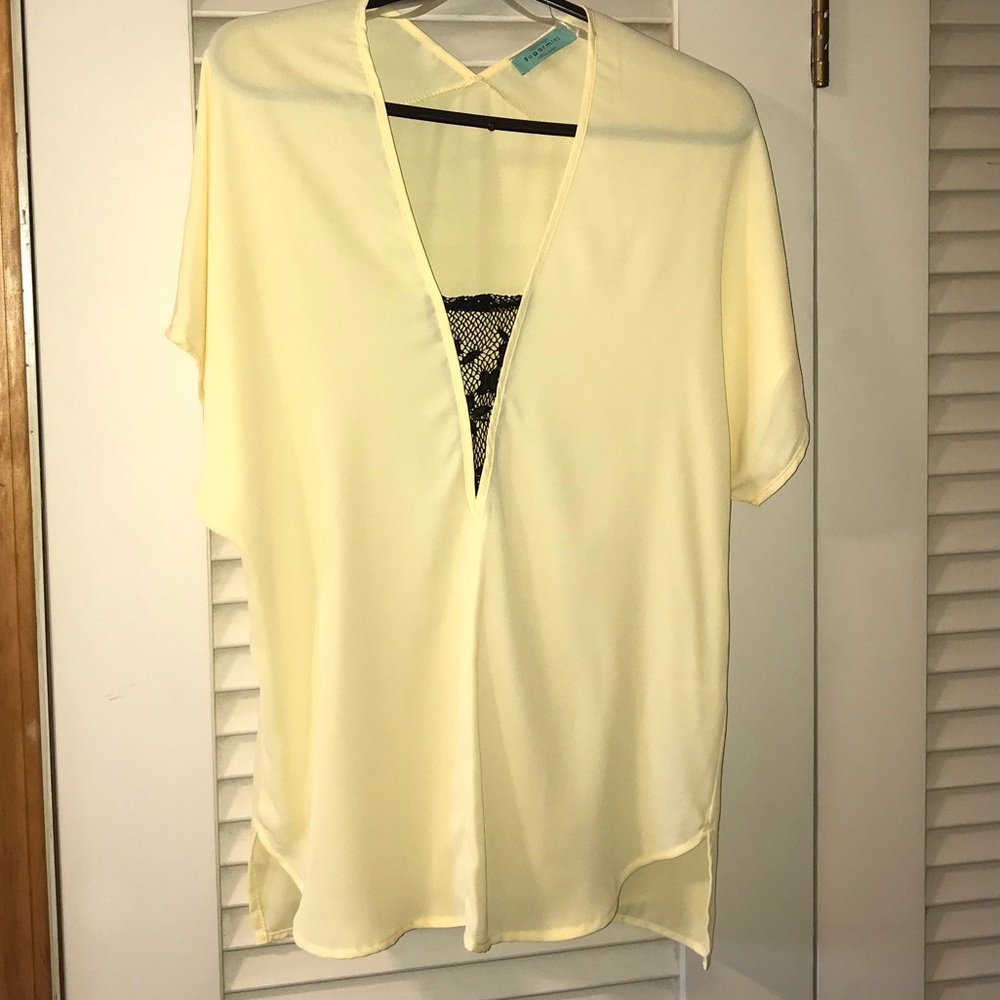 Yellow blouse with black