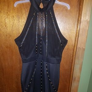 Black key hole dress with goldinlet design.