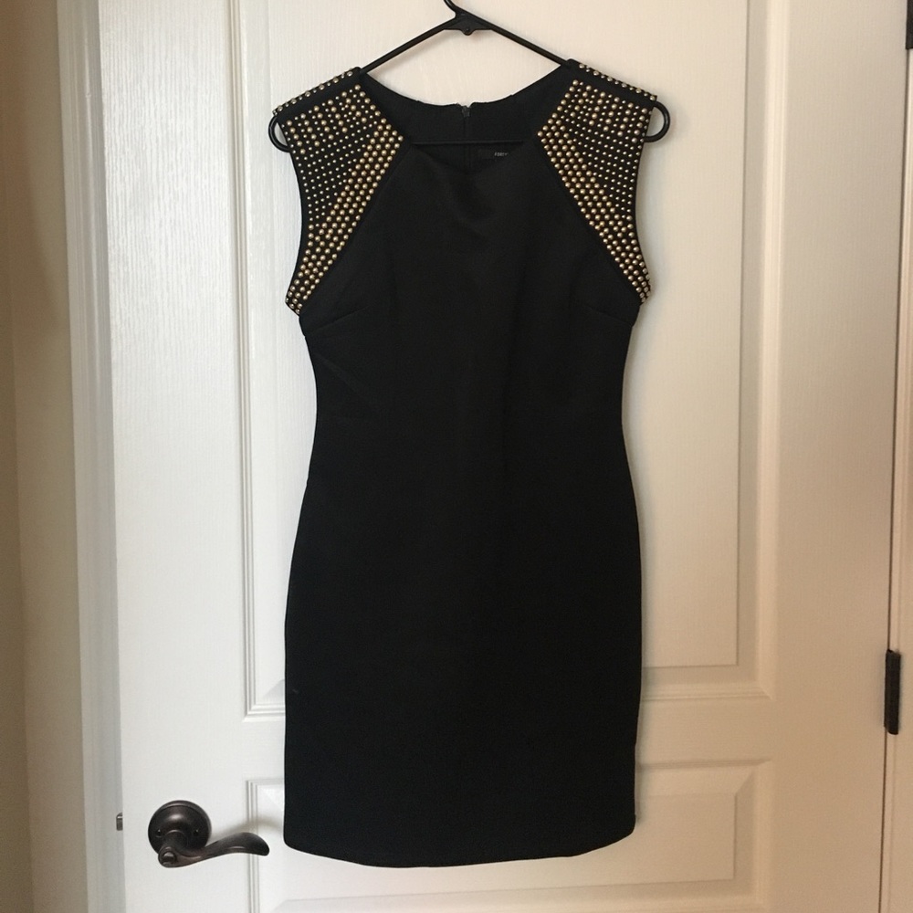 Forever 21 medium.  Black dress. gold studs.