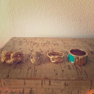 4 size 7 gold rings.