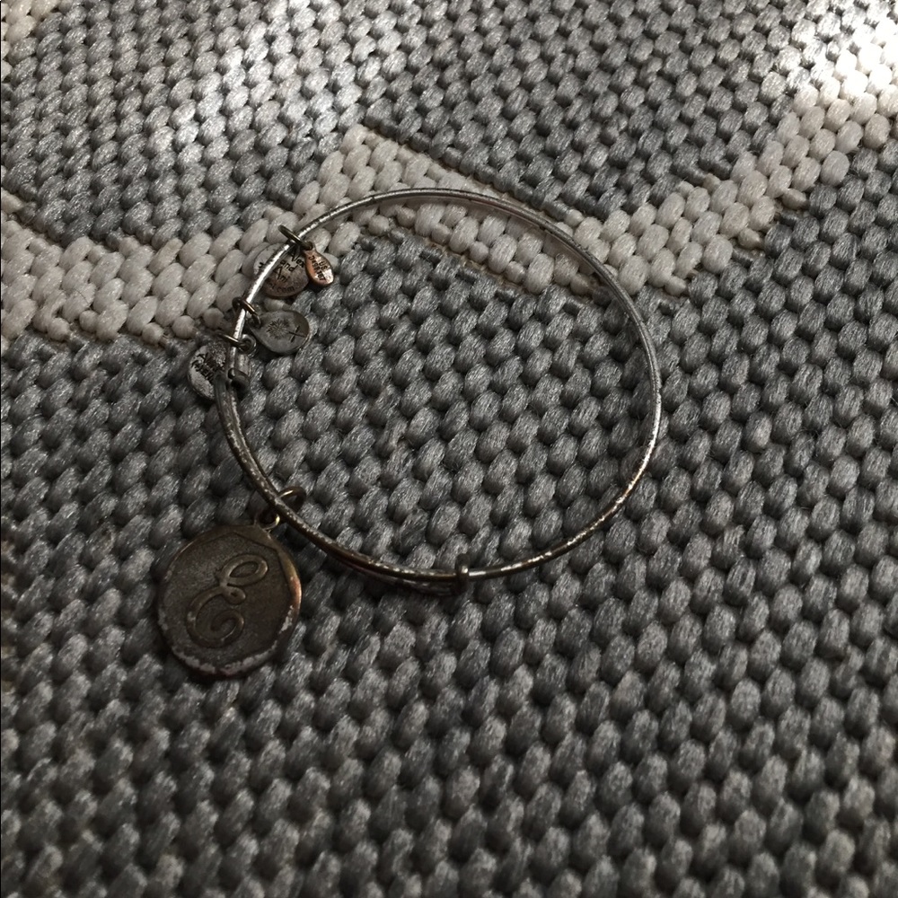 Silver Alex and ani bangle with”e” charm