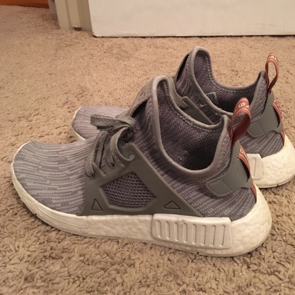 Grey and rose pink Adidas NMDs