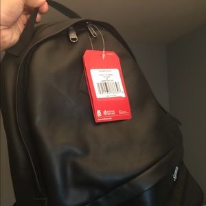 Supreme x TNF black leather day bag
