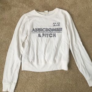 White graphic sweater