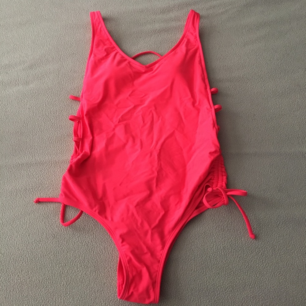 Brand new one piece bathing suit. Only tried on.