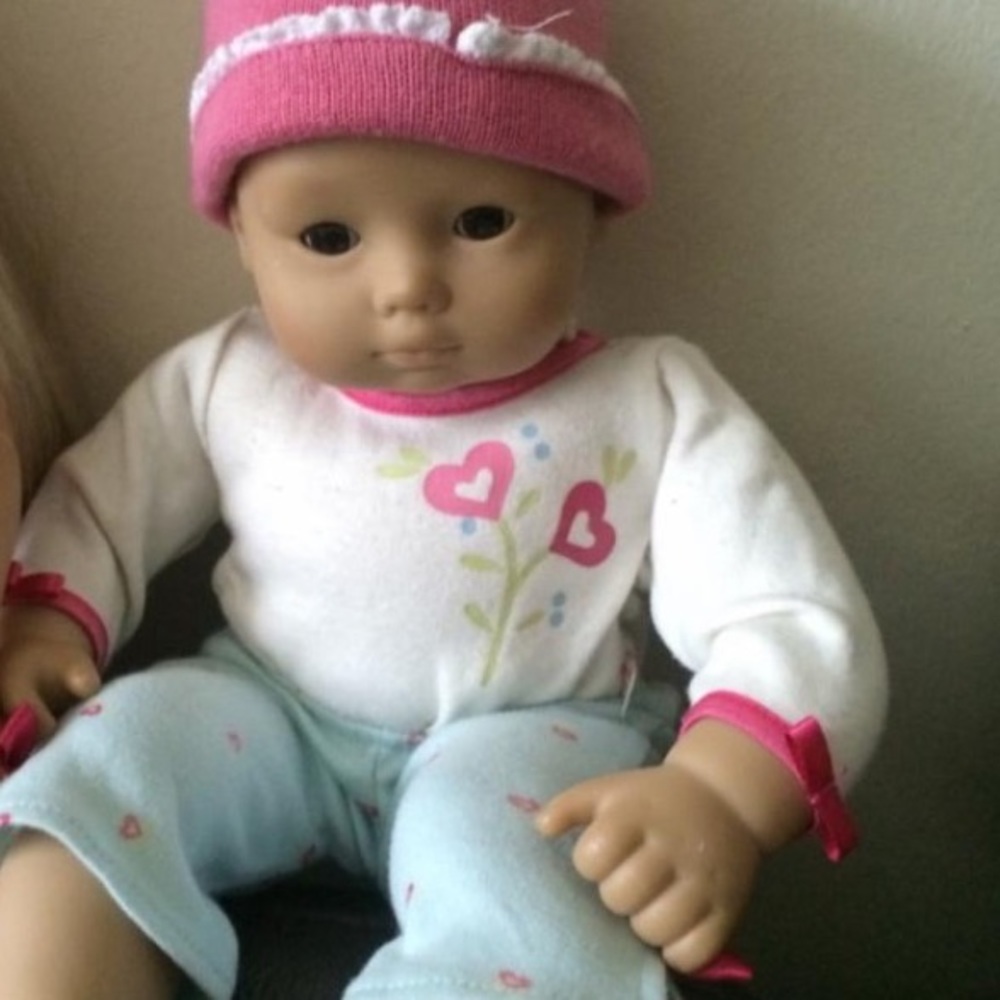 American girl babydoll with carrier