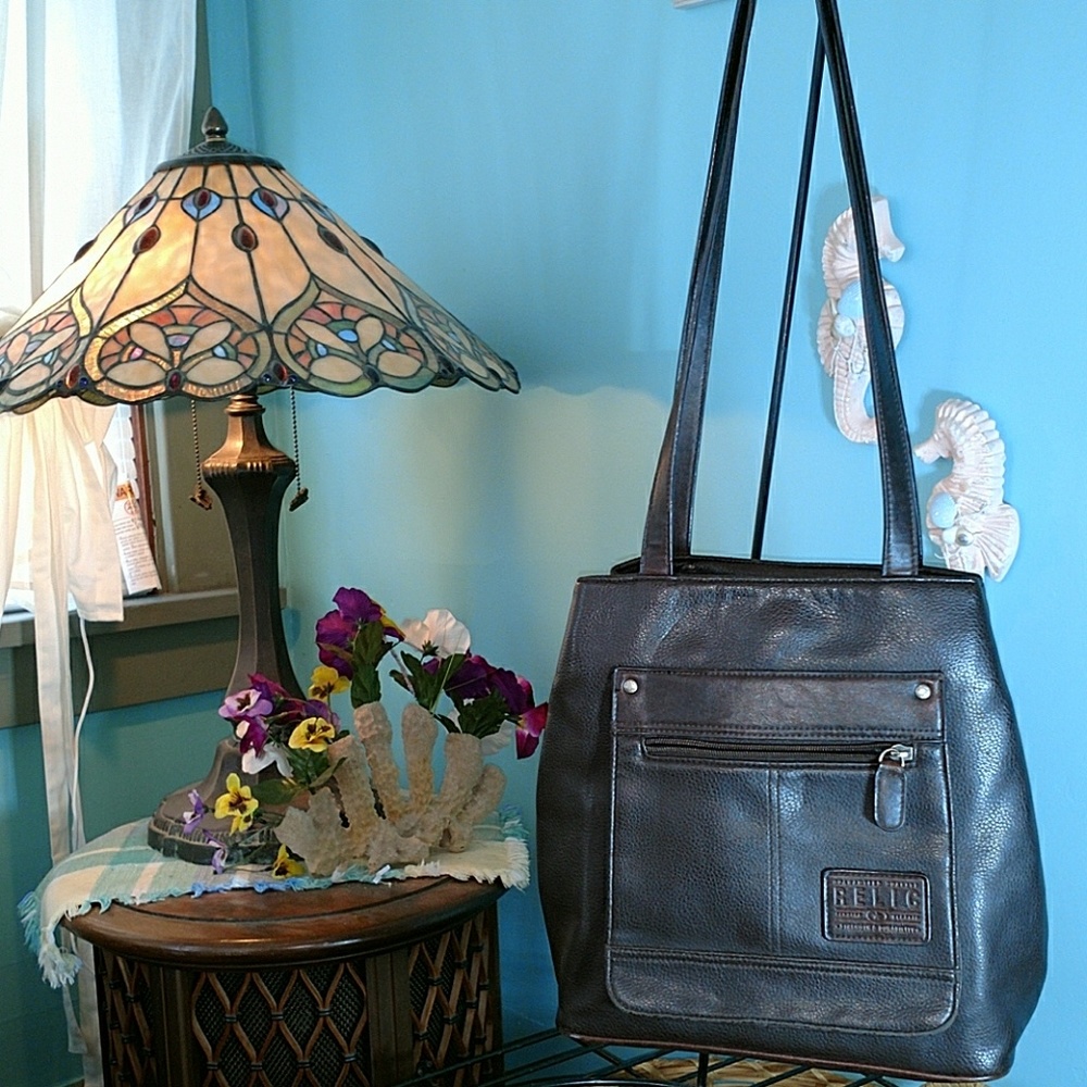 Relic... Long handle. Bucket style shoulder bag.