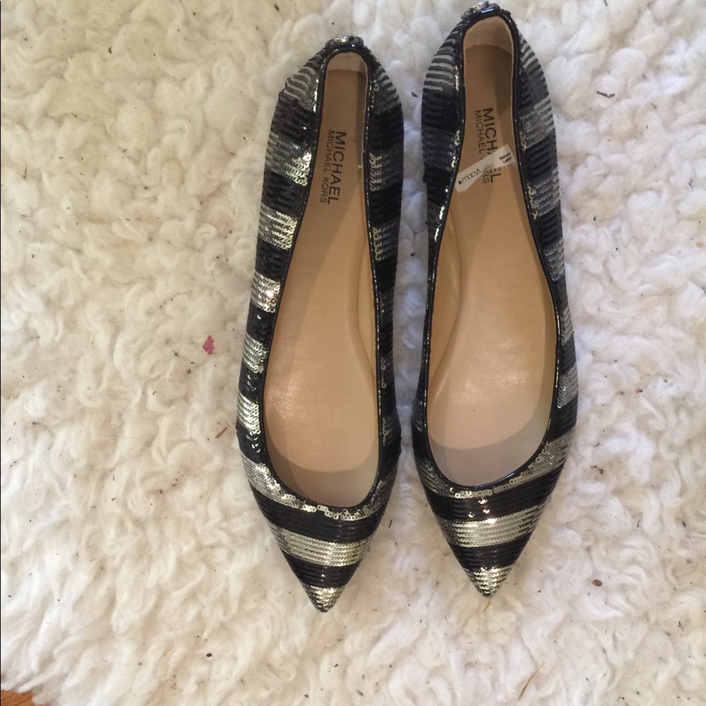 Brand new Micheal kors shoes black and silver