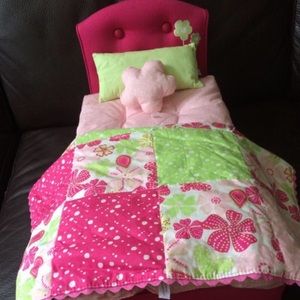 American Girl bed with blanket and pillow