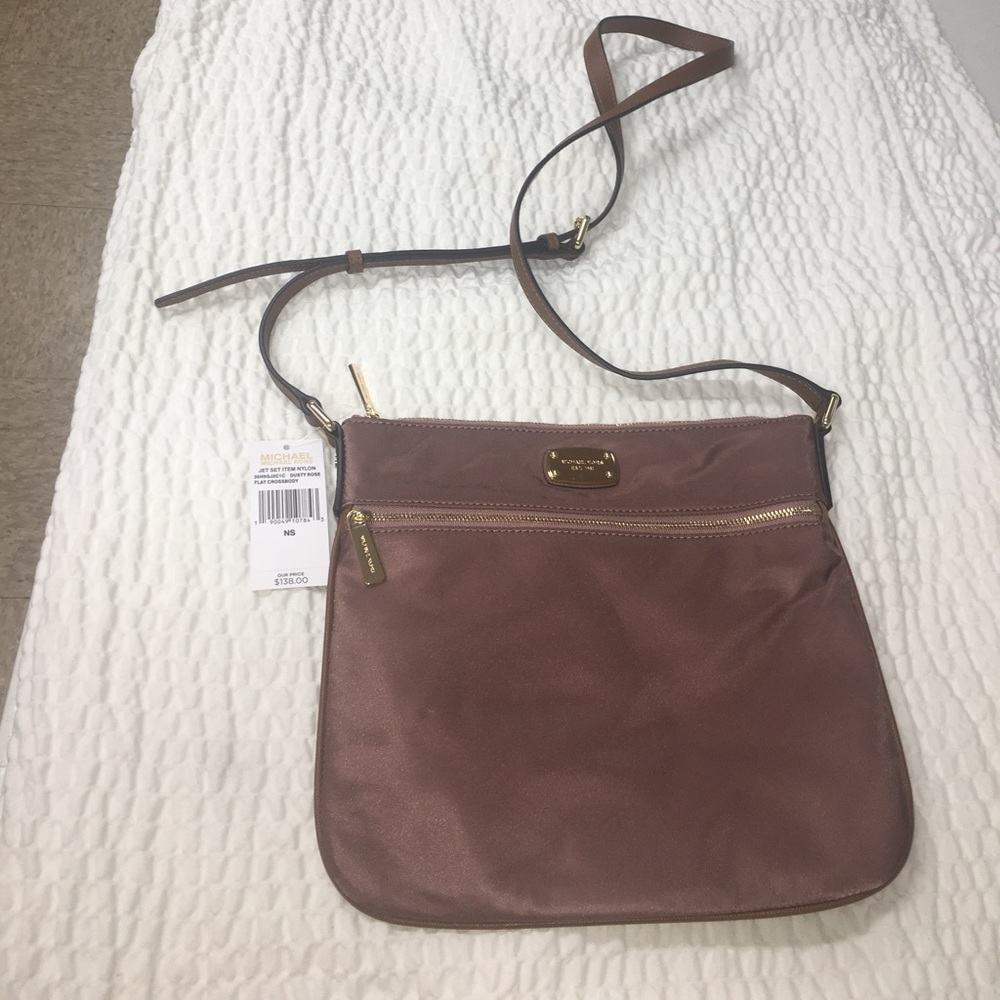 Brand new Michael kors flat cross body