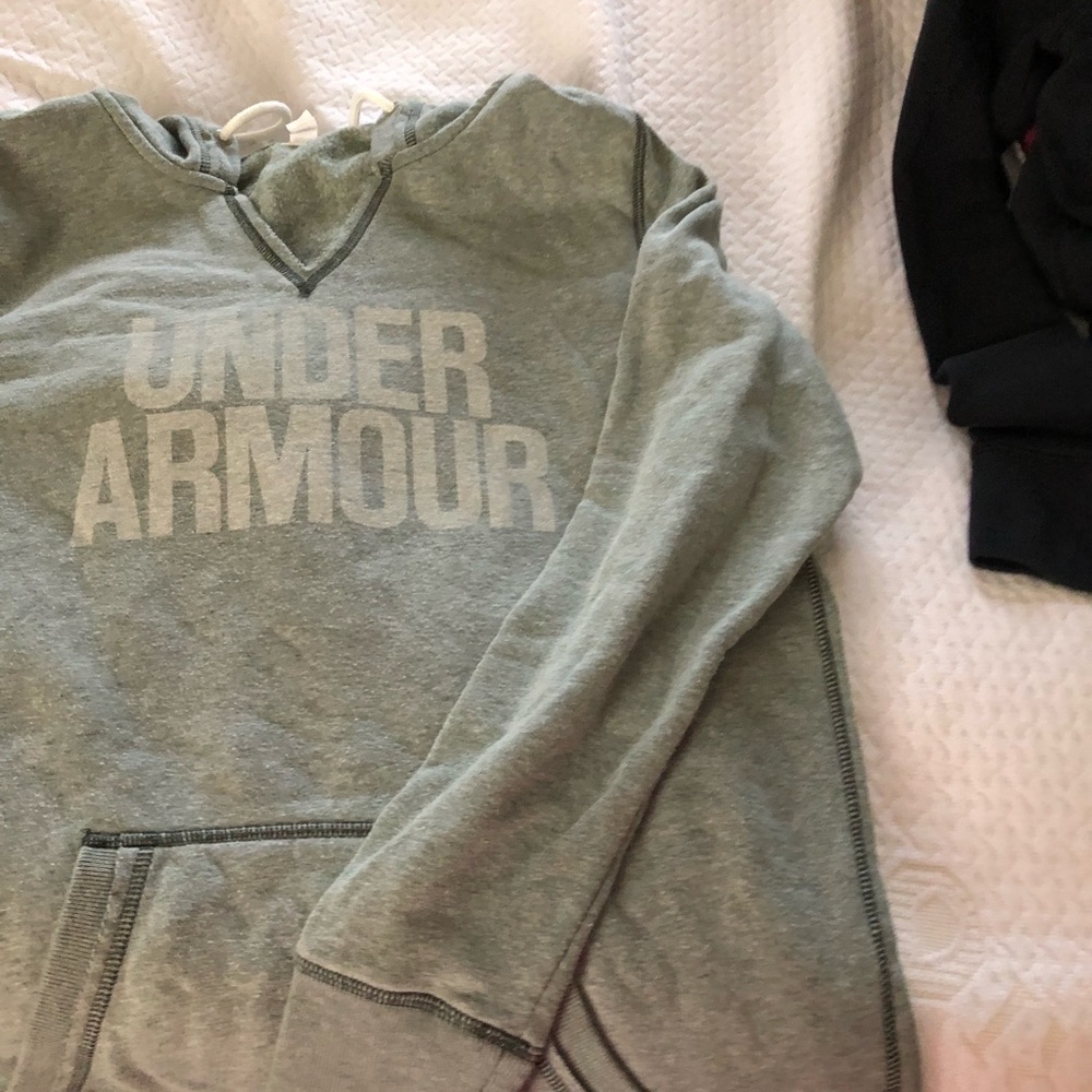 Fleece hoodie has worn spots under arms