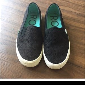 Black slip on sneakers