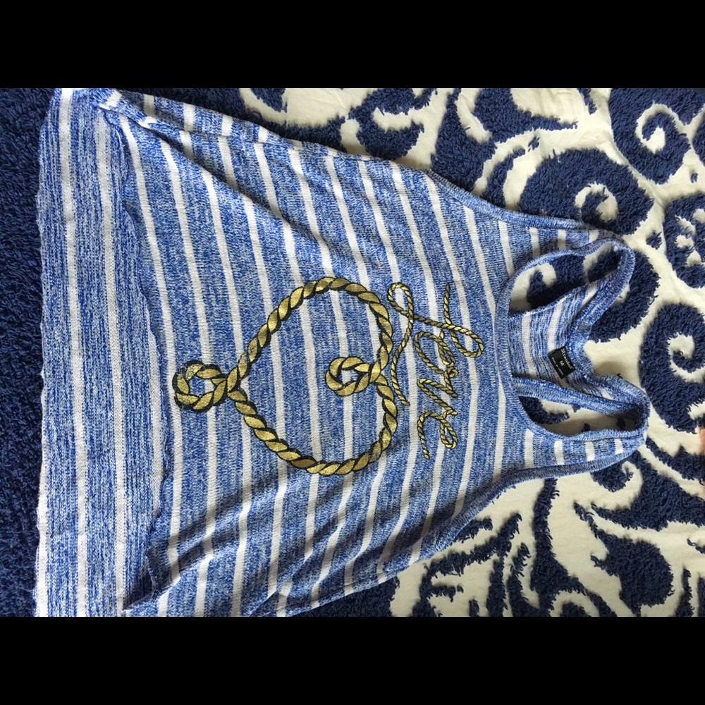 High low tank with heart anchor