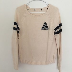 Athletic stripe knit sweater