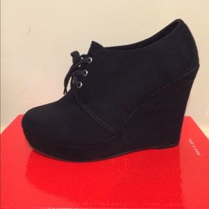 Black wedge booties