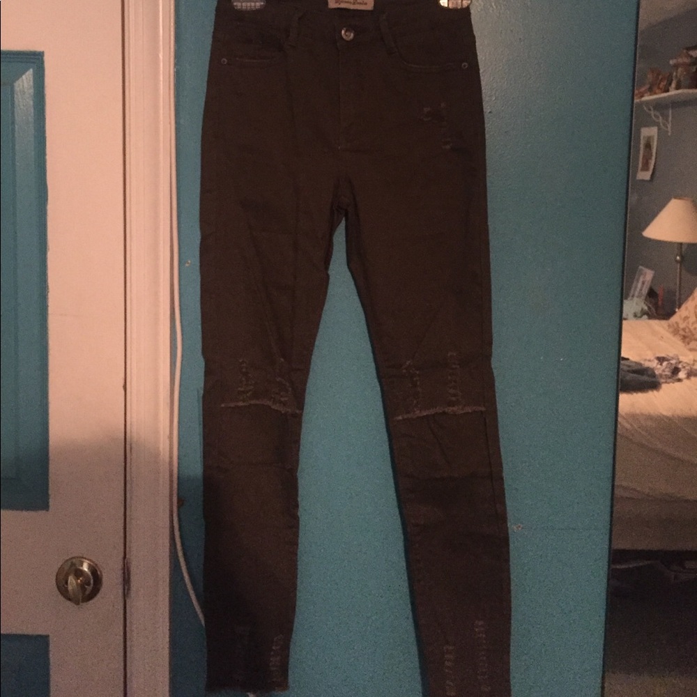 Khaki low rise distressed skinny jeans