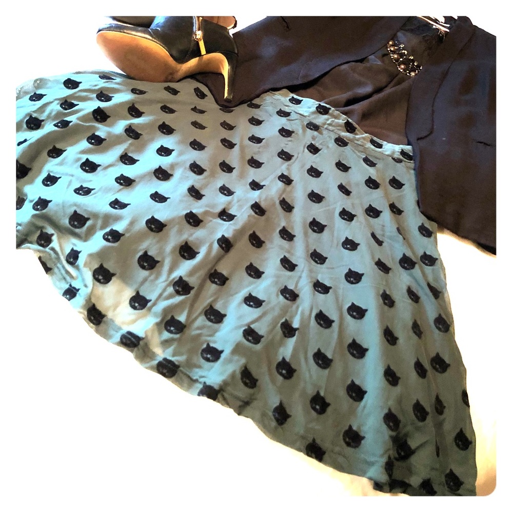 Adorable a-line skirt; dark green with cat detail