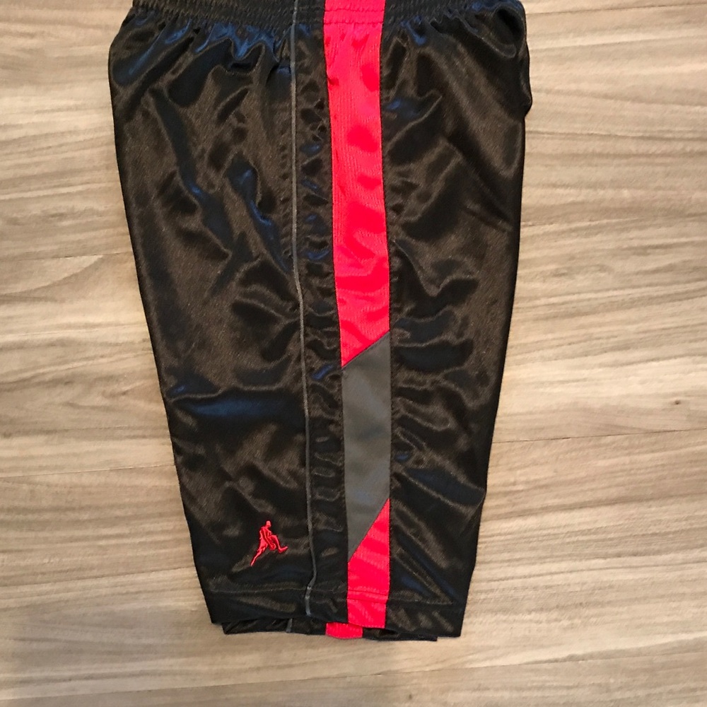 Boys 100% polyester basketball shorts.