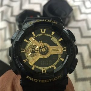 G-SHOCK MALE WATCH black and gold